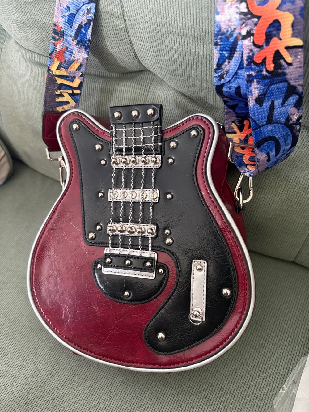 Guitar-Shaped Crossbody Bag in Burgundy & Black with Colorful Strap 9”x 9”x 3” - Picture 2 of 5